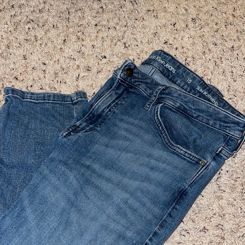 calvin klein medium wash denim pants